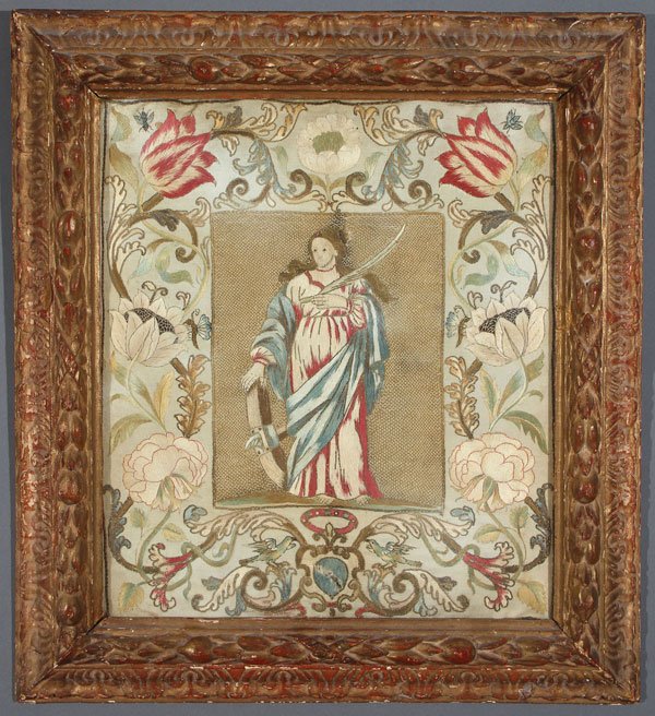 A SILK AND BULLION EMBROIDERED TEXTILE PANEL: A SILK AND BULLION EMBROIDERED TEXTILE PANEL, 17TH CENTURY, PROBABLY FRENCH. The central panel of basket weave bullion embroidery with silk embroidered figure of Saint Catherine of Alexandria, surroun