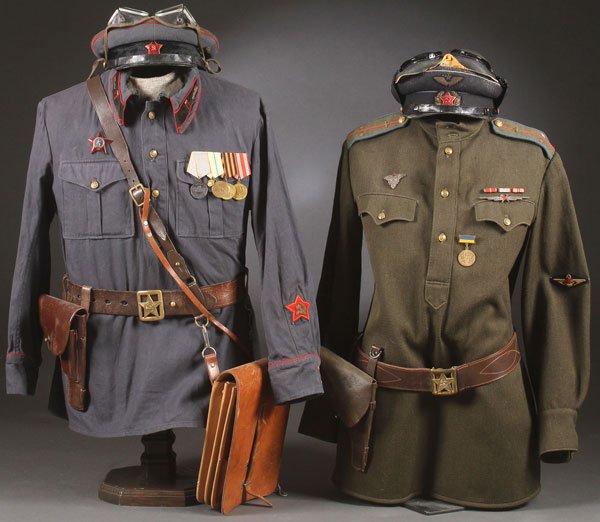 GROUP OF TWO RUSSIAN SOVIET WWII PERIOD UNIFORMS: A GROUP OF TWO RUSSIAN SOVIET WWII PERIOD UNIFORMS AND FIVE LATER UNIFORM BLOUSES. Comprising a WWII SR. Political advisor uniform (armor style) exhibiting the Order of the Red Star, Combat Service me