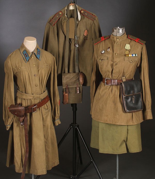 6 SOVIET WWII & LATER WOMEN'S UNIFORMS: A GROUP OF SIX RUSSIAN SOVIET WWII AND LATER WOMEN’S UNIFORMS. Comprising a 1940’s vintage women’s Jr. Politruk Lieutenants uniform with leather belt and holster. A WWII vintage women’s medica