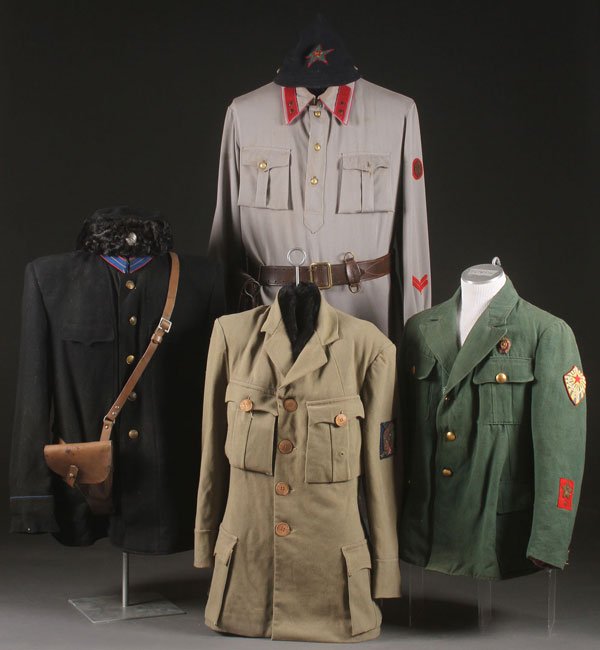 A GROUP OF SIX RUSSIAN SOVIET AND LATER UNIFORMS: A GROUP OF SIX RUSSIAN SOVIET AND LATER UNIFORMS. Comprising a Gulag guard-style uniform with Finka NKVD Gulag style hat and leather pistol holder. A JR. Politruk uniform with OGPU summer Budenovka an