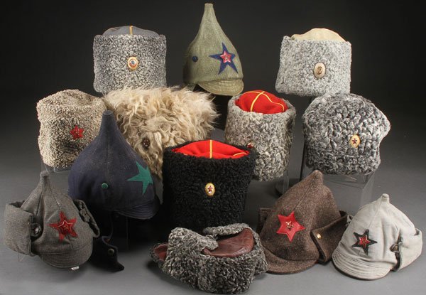 13 RUSSIAN SOVIET & EARLY SOVIET HEADGEAR: A GROUP OF 13 RUSSIAN SOVIET AND EARLY SOVIET STYLE WINTER HEADGEAR.