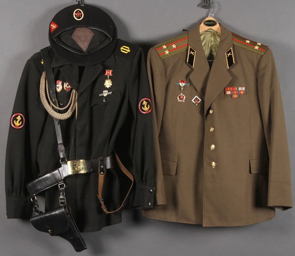 GROUP OF 24 PLUS SOVIET RUSSIAN UNIFORM ELEMENTS: A GROUP OF 24 PLUS SOVIET RUSSIAN UNIFORM ELEMENTS, CIRCA 1970 – 1990. Including uniforms representing a variety of different armed forces, including Navy and Army, comprising both officer and enlis