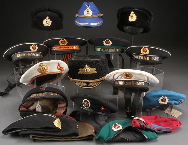 A GROUP OF RUSSIAN SOVIET MILITARY HATS: A GROUP OF RUSSIAN SOVIET MILITARY HATS. Including both Officer Corps and Enlisted men’s examples. Peaked caps, berets, and other types. Circa 1970-1990.