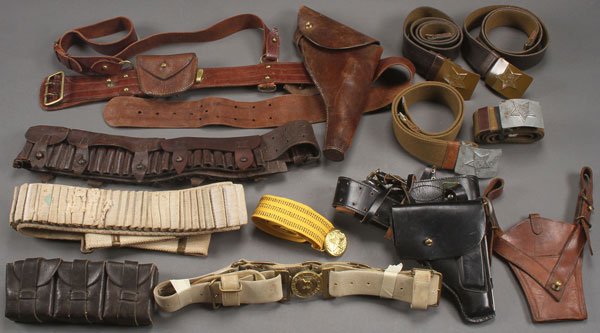 40 MILITARY BELTS, SLINGS, AND HOLSTERS: A GROUP OF OVER 40 MILITARY BELTS, SLINGS, AND HOLSTERS, CIRCA 1900-1990. Including various, primarily European, countries as well as the Soviet Union and other Eastern Bloc nations.