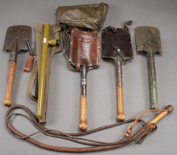 A GROUP OF FOUR ENTRENCHING TOOLS: A GROUP OF FOUR ENTRENCHING TOOLS. Including a Russian WWI example, dated 1916. As well as two Swiss examples and possibly another Russian example. Together with a Soviet sniper trench periscope with 