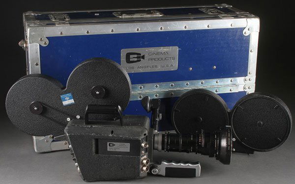 A CINEMA PRODUCTS CP-16 MOTION SOUND CAMERA: A CINEMA PRODUCTS CP-16 MOTION SOUND CAMERA, CIRCA 1970. The 16mm reflex camera with Crystasound pre-amp 2.2/12-120mm Angenieux zoom lens, two-PLC-4 and two Mitchell film magazines, two power adapters