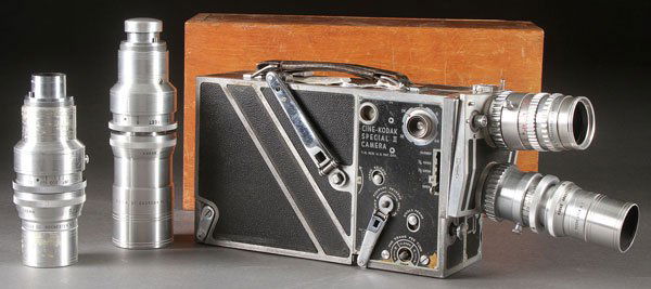 A CINE-KODAK SPECIAL II MOTION PICTURE CAMERA: A CINE-KODAK SPECIAL II MOTION PICTURE CAMERA. The two lens turret mounted with a 2.5/38mm Ektanon and 2.7/2.5 inch Anastigmat lens together with a 2.7/102mm Anastigmat and 4.5/152mm telephoto lens, t