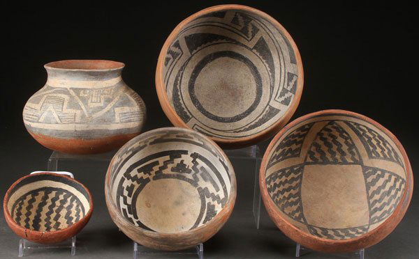 FIVE PRE HISTORIC GILA POLYCHROME BOWLS: A GOOD GROUP OF FIVE PRE HISTORIC GILA POLYCHROME POTTERY BOWLS AND VESSELS, SALADO, A.D. 1300-1450. Each well decorated on the interior or exterior with black geometric designs, some restorations. Th