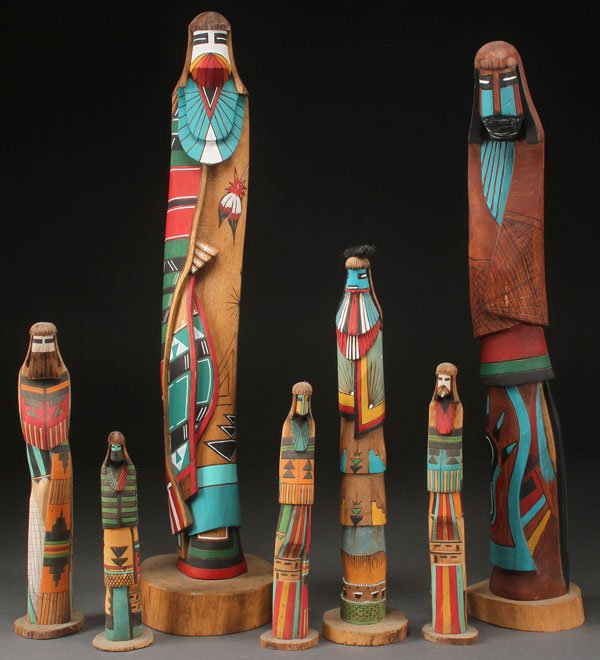 A COLLECTION OF SOUTHWEST NATIVE AMERICAN SHALIKO: A COLLECTION OF SOUTHWEST NATIVE AMERICAN SHALIKO “KACHINA” CARVINGS, LATE 20TH CENTURY. Carved and polychrome wood, seven figures of various sizes. The largest two signed “John Beyale” and "J