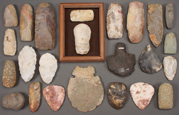 A GROUP OF 40 ASSORTED STONE TOOLS: A GROUP OF 40 ASSORTED STONE TOOLS. Including celts, hoes, scrapers, knives and fragments. The largest length 6.75 inches.