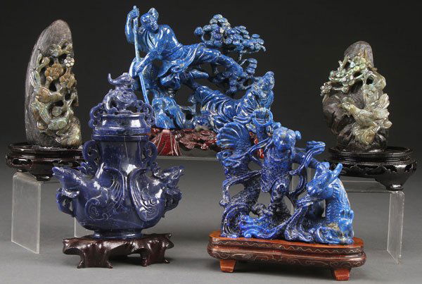 A THREE PIECE GROUP OF CHINESE CARVED BLUE LAPIS: A THREE PIECE GROUP OF CHINESE CARVED BLUE LAPIS, LAST HALF OF THE 20TH CENTURY. Comprising an archaic style lidded urn with mythical beast handles, a figural group of two men battling, and a figural