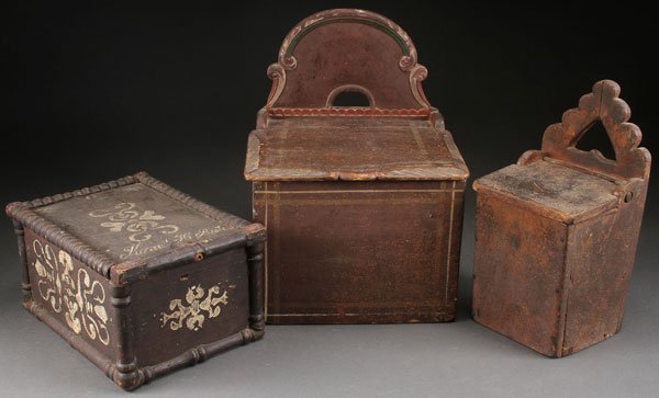 3 19TH C. NORWEGIAN WOOD PANTRY BOXES: A GROUP OF THREE 19TH CENTURY NORWEGIAN WOOD PANTRY BOXES. Comprising a decorated and spool turned box with sliding lid. A polychrome carved and handled back box with hinged top and a carved handle hi