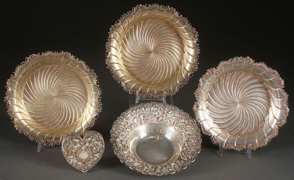 A FIVE PIECE GROUP OF 19TH CENTURY SILVER: A FIVE PIECE GROUP OF 19TH CENTURY SILVER. Comprising three "Pierre Gavard" wine coasters (1886-1895), an "A.G. Schultz" bowl with floral repousse, and a German .800 silver heart shape box, the hinge