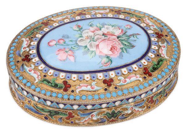 RUSSIAN SILVER & ENAMEL BOX: A LARGE RUSSIAN SILVER-GILT CLOISONNÉ AND SHADED ENAMEL BOX, SALTYKOV, MOSCOW, CIRCA 1895. Of oval flattened form, the sides banded in scrolling foliage on a stippled gilt ground with rope twist bor