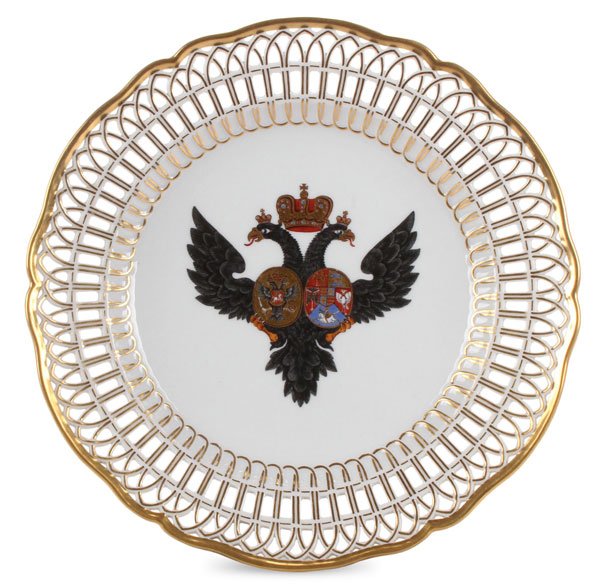 BERLIN SERVICE PORCELAIN PLATE, CIRCA 1778: A PORCELAIN PLATE FROM THE BERLIN SERVICE, KÖNIGLICHE PORZELLAN-MANUFAKTUR (KPM), BERLIN, CIRCA 1778. With pierced scalloped border and gilt highlighting, the cavetto with Imperial Russian double-hea