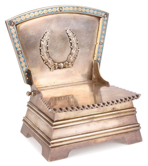 RUSSIAN SILVER SALT CHAIR, CIRCA 1900: A LARGE AND IMPRESSIVE RUSSIAN SILVER GILT AND CHAMPLEVÉ ENAMEL SALT CHAIR, MOSCOW, 1899-1908. Resting on four bracket feet, the backrest set with a laurel wreath and bordered with champlevé enamel