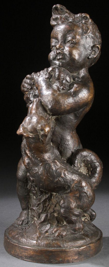 UKRANIAN BRONZE FIGURE, CIRCA 1930: ANTON PAVLOS (UKRANIAN 1905-1954). A patinated cast bronze figure, of a boy holding puppies, signed on base, 13.5 inches (34.3 cm). Shipping: Professional, affordable and efficient in house packing an