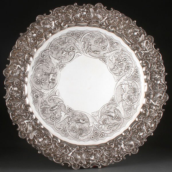 LARGE WILLIAM IV SILVER SALVER, 1829: A LARGE WILLIAM IV SILVER SALVER, MARK OF J.E. TERREY & CO, LONDON 1829. The outer center chased with eight scrolled scenic panels of a shepherd, wildlife, birds and florals within a raised scalloped 