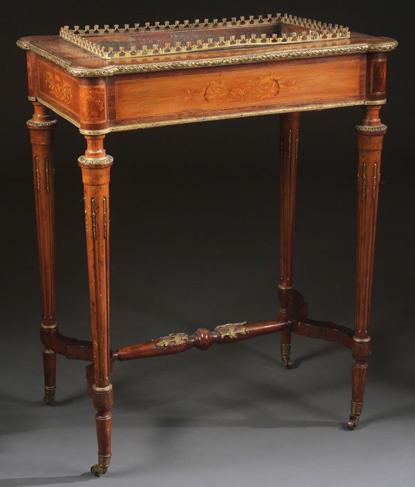 FRENCH GILT BRONZE LOUIS XV STYLE C. 1860: A FRENCH LOUIS XV STYLE MARQUETRY AND GILT BRONZE JARDINIÈRE, CIRCA 1860’S. The rectangular case in mahogany, satin wood and burled veneers. Containing an inset copper jardinière surmounted with a