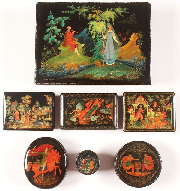 7 RUSSIAN HAND PAINTED LACQUER BOXES: A GROUP OF SEVEN RUSSIAN HAND PAINTED LACQUER BOXES, PALEKH, 1944-1994. The lids of each finely painted with various scenes, including patriotic and fairy tales. Each signed Palekh, some dated and all