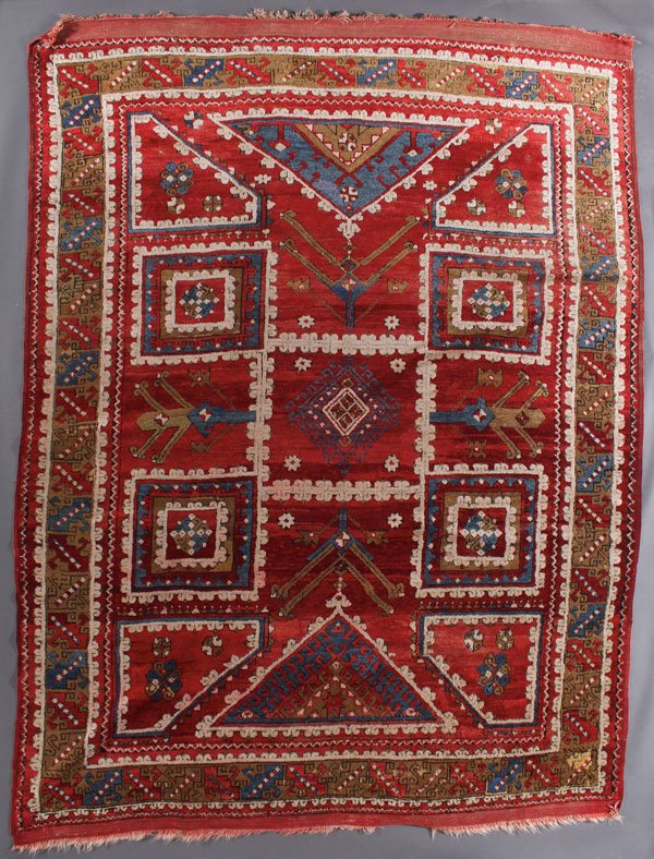 A TURKISH YORUK ORIENTAL RUG: A TURKISH YORUK ORIENTAL RUG, FIRST QUARTER 20TH CENTURY. 6 feet 5 inches x 8 feet 2 inches (195.5 x 248.9 cm). Provenance: From the lifetime estate collection of Jose Antonio Danobeitia (1942-2011). 