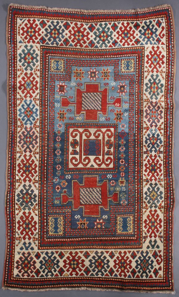 A KAZAK ORIENTAL RUG, SOUTHWEST CAUCASUS: A KAZAK ORIENTAL RUG, SOUTHWEST CAUCASUS, CIRCA 1900. In a Karachop variant pattern. 4 feet x 6 feet 9 inches (121.9 x 210.8 cm). Provenance: From the lifetime estate collection of Jose Antonio Danobe