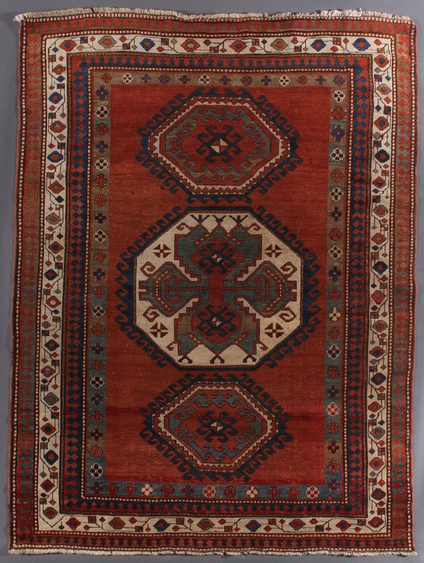 A KAZAK LORI PAMBAK ORIENTAL RUG: A KAZAK LORI PAMBAK ORIENTAL RUG, SOUTHWEST CAUCASUS, CIRCA 1920. 5 feet 7 inches x 7 feet 6 inches (170.1 x 228.6 cm). Provenance: From the lifetime estate collection of Jose Antonio Danobeitia (1942