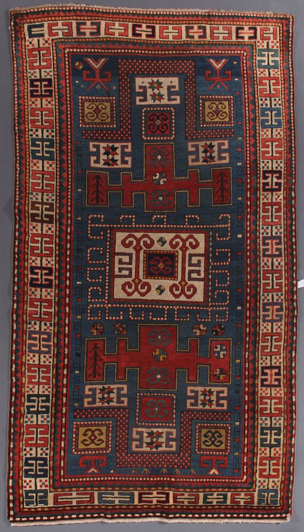 A KARACHOP KAZAK ORIENTAL RUG, SOUTHWEST CAUCASUS: AN INTRESTING KARACHOP KAZAK VARIANT ORIENTAL RUG, SOUTHWEST CAUCASUS, CIRCA 1910. 4 feet 3 inches x 7 feet 10 inches (129.5 x 238.7 cm). Provenance: From the lifetime estate collection of Jose Antoni