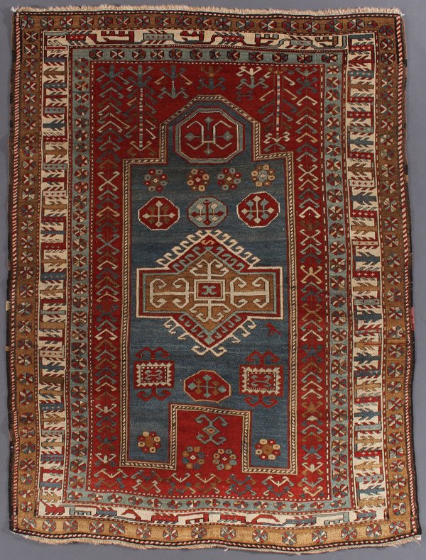 A KAZAK PRAYER RUG, FIRST QUARTER 20TH CENTURY: A KAZAK PRAYER RUG, FIRST QUARTER 20TH CENTURY. 4 feet 8 inches x 6 feet 4 inches (124.2 x 193 cm). Provenance: From the lifetime estate collection of Jose Antonio Danobeitia (1942-2011). Born in Spai