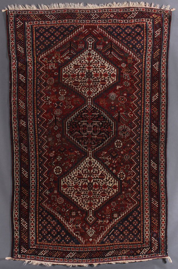 A QASHQAI ORIENTAL RUG, SOUTH PERSIA, CIRCA 1900: A QASHQAI ORIENTAL RUG, SOUTH PERSIA, CIRCA 1900. 3 feet 6 inches x 6 feet (106.7 x 182.9 cm). Provenance: From the lifetime estate collection of Jose Antonio Danobeitia (1942-2011). Born in Spain, Mr