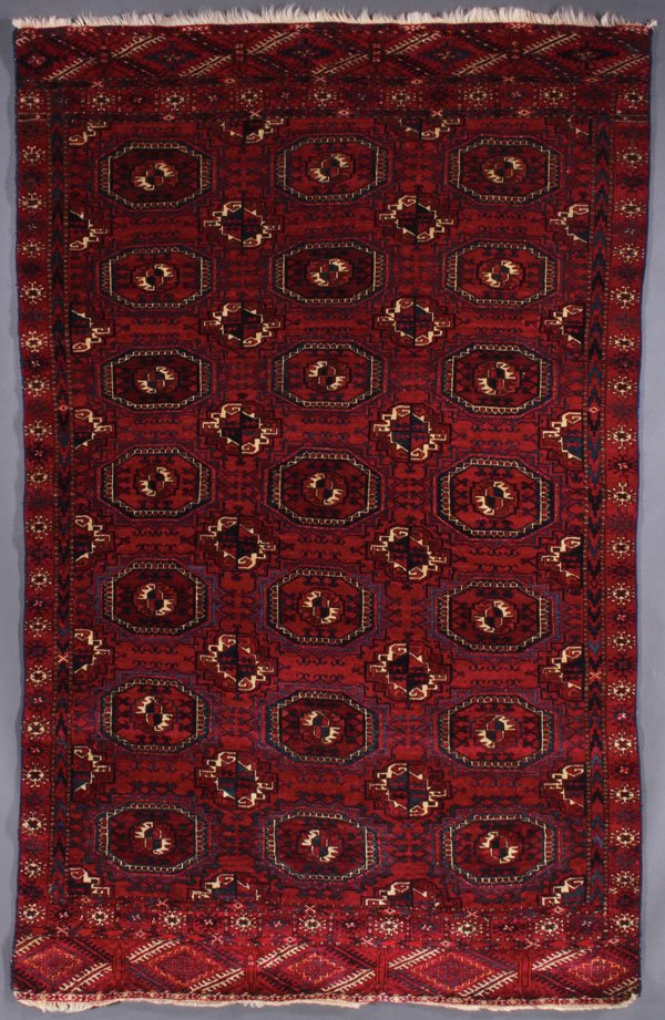 A TURKOMAN BOKARA ORIENTAL RUG, CONTEMPORARY: A TURKOMAN BOKARA ORIENTAL RUG, CONTEMPORARY. 4 feet x 6 feet 6 inches (121.9 x 198.1 cm). Provenance: From the lifetime estate collection of Jose Antonio Danobeitia (1942-2011). Born in Spain, Mr. Da