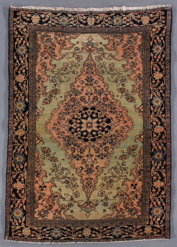 A PERSIAN FARAHAN SAROUK ORIENTAL RUG, CIRCA 1910: A PERSIAN FARAHAN SAROUK ORIENTAL RUG, CIRCA 1910. 3 feet 4 inches x 4 feet 9 inches (101.6 x 144.8 cm ). Provenance: From the lifetime estate collection of Jose Antonio Danobeitia (1942-2011). Born i