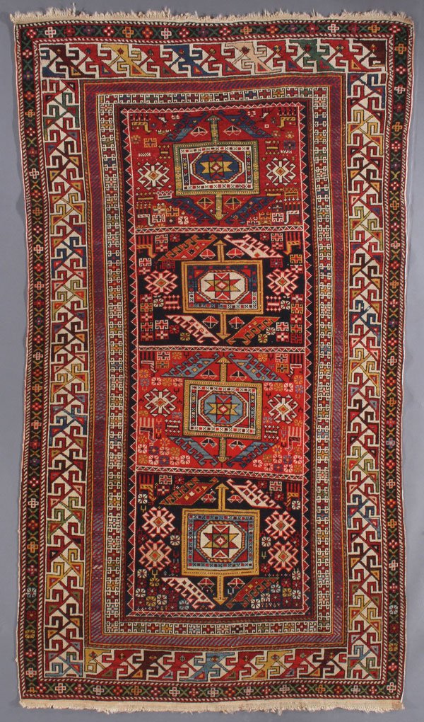 A SHIRVAN ORIENTAL RUG, EAST CAUCASUS: A SHIRVAN ORIENTAL RUG, EAST CAUCASUS, SECOND QUARTER 20TH CENTURY. 4 feet 4 inches x 5 feet 10 inches (132.1 x 177.8 cm). Provenance: From the lifetime estate collection of Jose Antonio Danobeitia (1