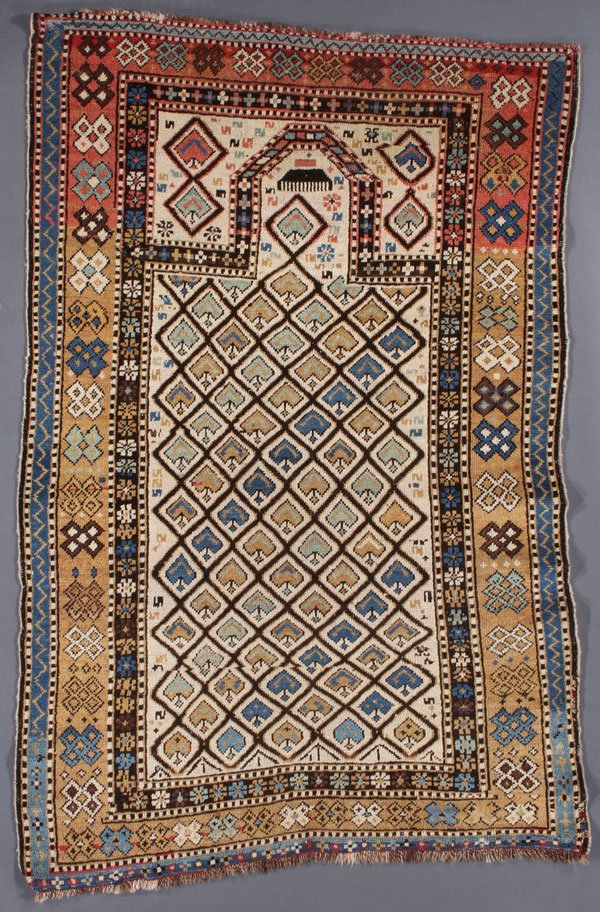A SHIRVAN PRAYER RUG, EAST CAUCASUS: A SHIRVAN PRAYER RUG, EAST CAUCASUS, FIRST QUARTER 20TH CENTURY. 3 feet 2 inches x 4 feet 11 inches (96.5 x 149.9 cm). Provenance: From the lifetime estate collection of Jose Antonio Danobeitia (1942-