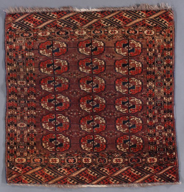 A TEKKE TURKOMAN SMALL RUG, CIRCA 1900: A TEKKE TURKOMAN SMALL RUG, CIRCA 1900. 3 feet 3 inches x 3 feet 2 inches (99.1 X 96.5 cm). Provenance: From the lifetime estate collection of Jose Antonio Danobeitia (1942-2011). Born in Spain, Mr. D