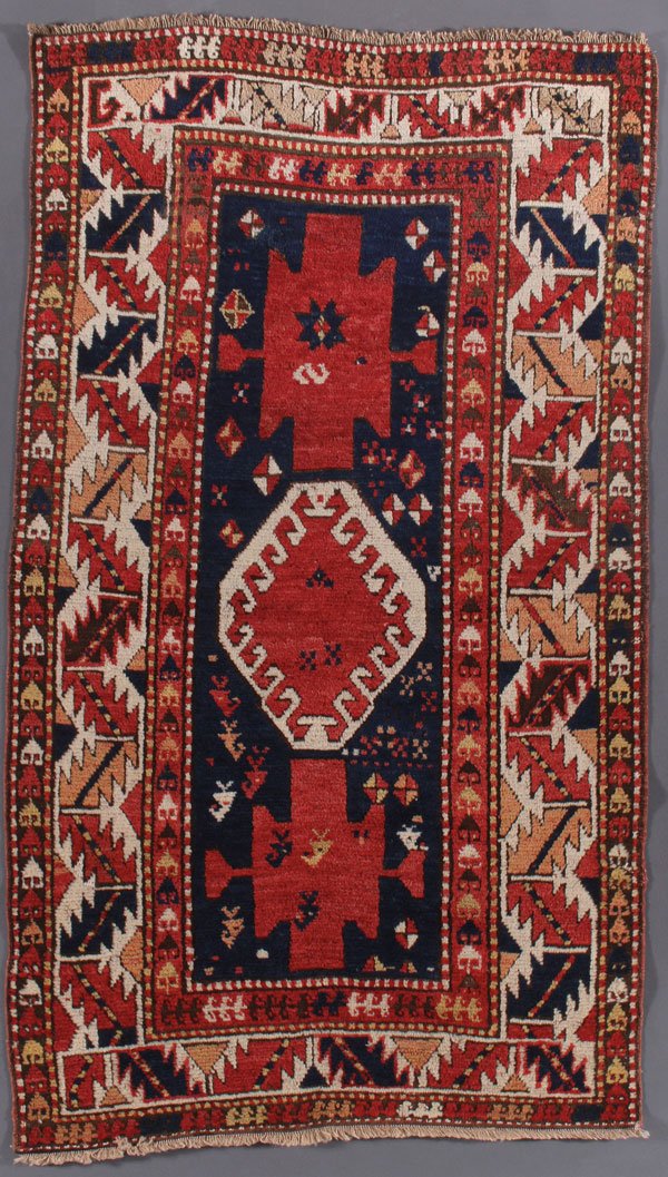 A GENJE KAZAK RUG, CONTEMPORARY: A GENJE KAZAK RUG, CONTEMPORARY. 3 feet 10 inches x 6 feet 7 inches (116.8 x 200.7 cm). Provenance: From the lifetime estate collection of Jose Antonio Danobeitia (1942-2011). Born in Spain, Mr. Danob