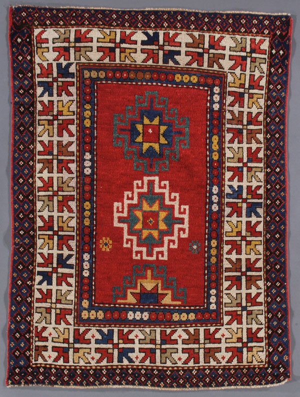 A KAZAK RUG SOUTHWEST CAUCASUS, FIRST QUARTER 20T: A KAZAK RUG SOUTHWEST CAUCASUS, FIRST QUARTER 20TH CENTURY. 2 feet 10 inches x 3 feet 10 inches (86.4 X 116.8 cm). Provenance: From the lifetime estate collection of Jose Antonio Danobeitia (1942-2011