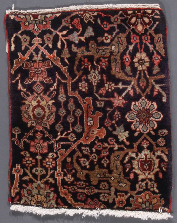A PERSIAN BIJAR WAGIREH OR SAMPLER, CIRCA 1910: A PERSIAN BIJAR WAGIREH OR SAMPLER, CIRCA 1910. Cotton foundation. 1 foot 5 inches x 1 foot 9 inches (43.2 x 53.3 cm). Provenance:From the lifetime estate collection of Jose Antonio Danobeitia (1942-2
