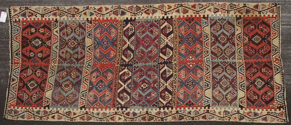 A TURKISH KILIM RUG, SECOND QUARTER 20TH CENTURY: A TURKISH KILIM RUG, SECOND QUARTER 20TH CENTURY. 5 feet x 11 feet 6 inches (180.3 x 182.9 cm). Provenance: From the lifetime estate collection of Jose Antonio Danobeitia (1942-2011). Born in Spain, M