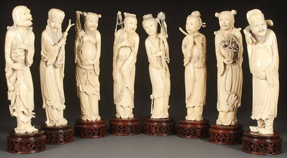 CHINESE CARVED IVORY GROUP OF THE EIGHT LUCK GODS: A VERY FINE CHINESE CARVED IVORY GROUP OF THE EIGHT LUCK GODS, LATE 19TH CENTURY. Each carved in good detail and with animated facial expressions holding various accoutrements and Buddhist symbols and