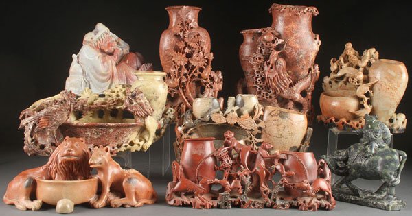 9 FINE CARVED CHINESE SOAPSTONE PIECES 19TH & 20TH C.: A NINE PIECE GROUP OF CHINESE CARVED SOAPSTONE ORNAMENTS, 19th & 20TH CENTURY. Including a dragon vase, monkeys and birds vase, scenic groups, immortals and animal figures. Largest height 9 inches (23