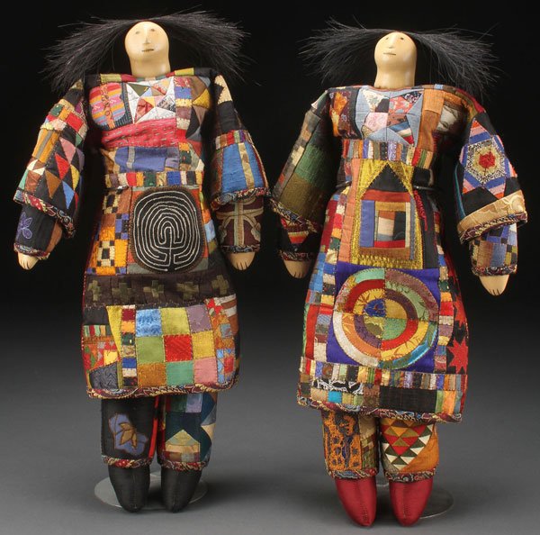 A PAIR OF CHARLA KHANNA NATIVE AMERICAN ARTIST DO: A PAIR OF CHARLA KHANNA NATIVE AMERICAN ARTIST DOLLS, 20TH CENTURY. Both of large proportions with hand sculpted composition head and hands, hand painted features and applied horse hair dressed with p