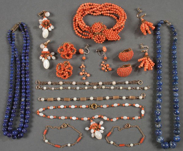 A FIFTEEN PIECE GROUP OF BLUE LAPIS CORAL AND: A FIFTEEN PIECE GROUP OF BLUE LAPIS CORAL AND PEARL JEWELRY. Including a Miriam Haskell bangle and matching earrings, a pair of Ciner earrings, two blue Lapis necklaces, and other items.