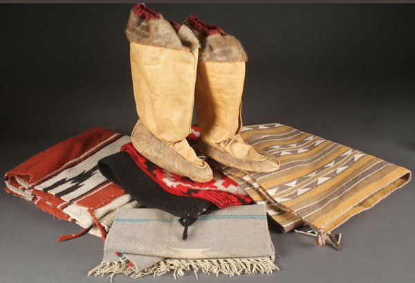 A GROUP OF NATIVE AMERICAN AND MEXICAN TEXTILES: A GROUP OF NATIVE AMERICAN AND MEXICAN TEXTILES. Comprising four small rugs and mats and a pair of Northwest sealskin and fur-trimmed mucklucks.