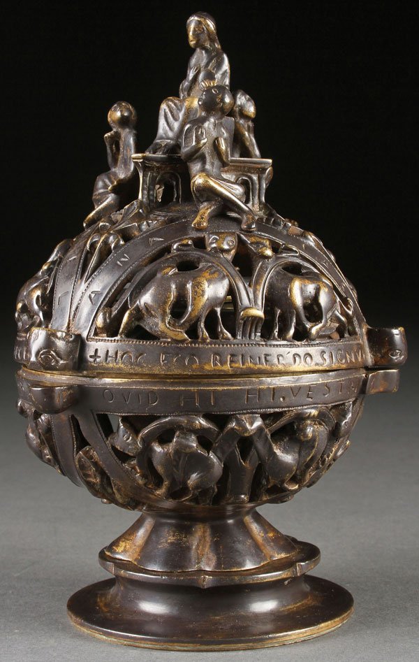 INTERESTING GOTHIC BRONZE INKWELL: AN EXCEPTIONAL GOTHIC REVIVAL RETICULATED BRONZE INKWELL MODELED AS A CENSER, PROBABLY FRENCH, 19TH CENTURY. Of spherical form finely sculpted with animal figures in scrolled arches and surmounted wit