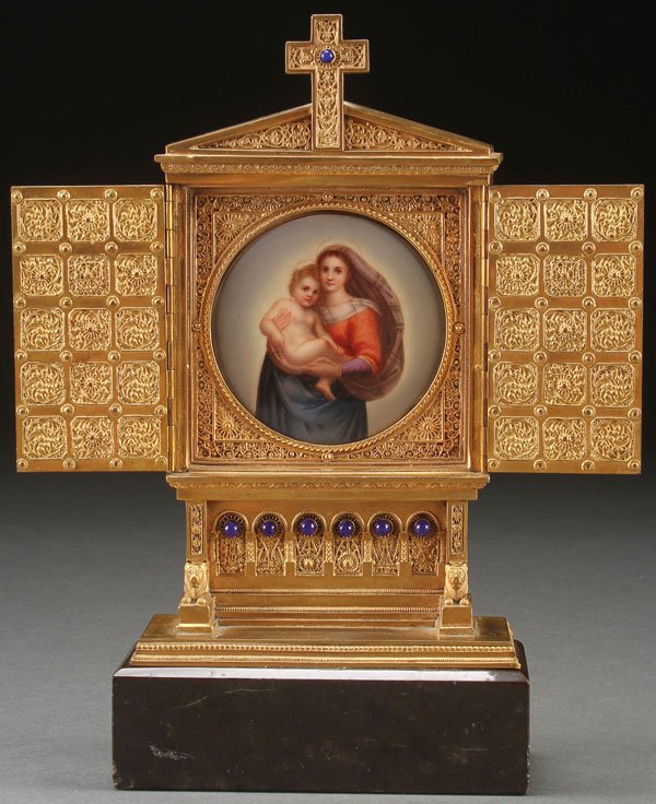GILT BRONZE BYZANTINE STYLE TRIPTYCH: AN IMPRESSIVE GILT BRONZE AND HAND PAINTED NEO BYZANTINE TRIPTYCH SHRINE, CIRCA 1890. Resting on a polished marble base with beveled edge, the rectangular stepped platform supporting an imposing shrin