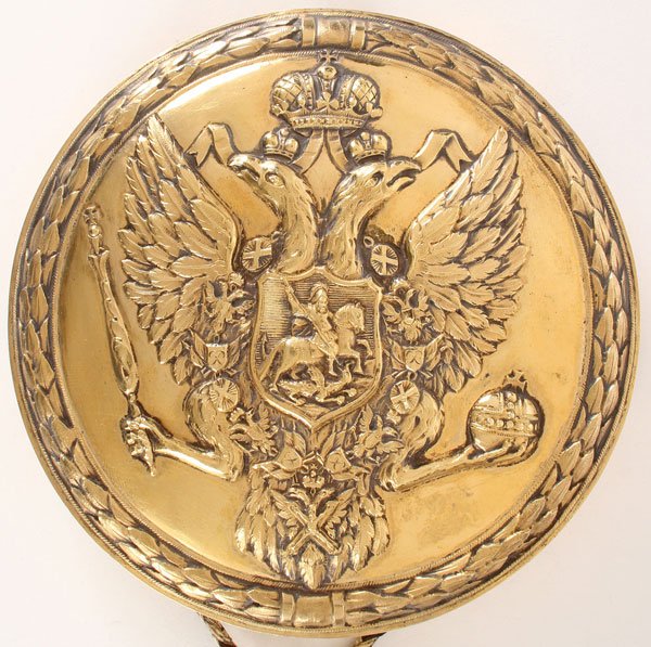 IMPERIAL RUSSIAN GILDED SILVER SEAL CASE, 1797: AN IMPRESSIVE IMPERIAL RUSSIAN GILDED SILVER AND REPOUSSE SEAL CASE, REIGN OF TSAR PAUL I, ST. PETERSBURG, 1797. The two piece circular case with fitted lid repousséd with the Imperial double headed 