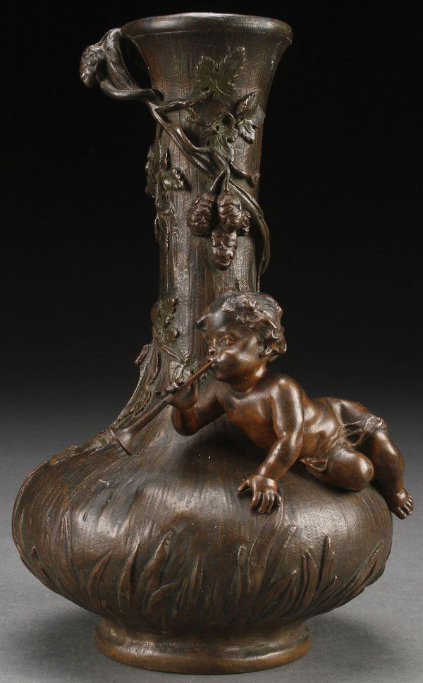 FRENCH BRONZE VASE SIGNED J. PFEFFER: A CHARMING FRENCH PATINATED BRONZE FIGURAL VASE, J. PFEFFER, CIRCA 1900. The bottle form with slightly flared base and lip, the sides sculpted overall in relief with leaves, vines and pinecones and s