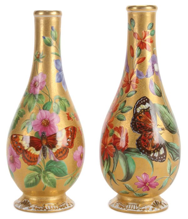 RUSSIAN IMPERIAL PORCELAIN VASES: TWO FINE RUSSIAN IMPERIAL PORCELAIN VASES, PERIOD OF NICHOLAS I (1825-1855). Each resting on a slightly flared and raised foot with Rococo scrolls, the bulbous gilt body with tapering neck and finely 