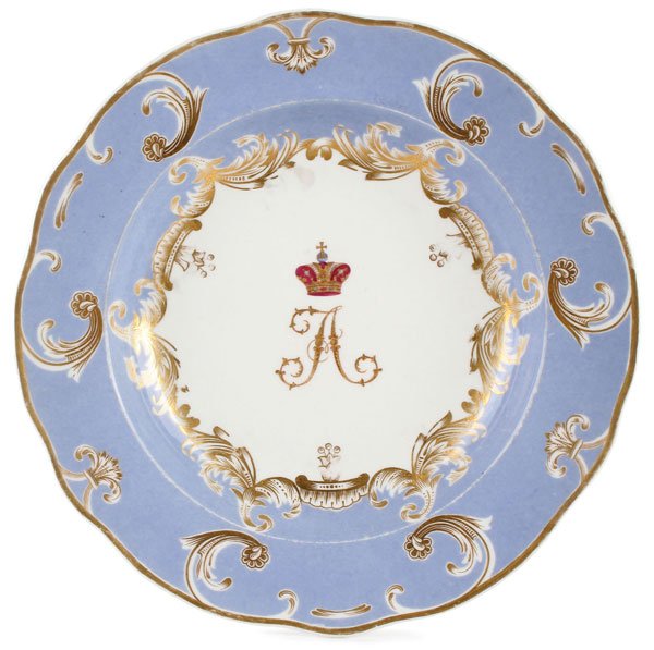 RUSSIAN IMPERIAL PORCELAIN PLATE: A RUSSIAN PORCELAIN PLATE FROM THE BANQUET SERVICE, IMPERIAL PORCELAIN FACTORY, PERIOD OF NICHOLAS I (1825-1855). The cavetto with the Cypher of Alexander beneath a crown, the borders scalloped and 